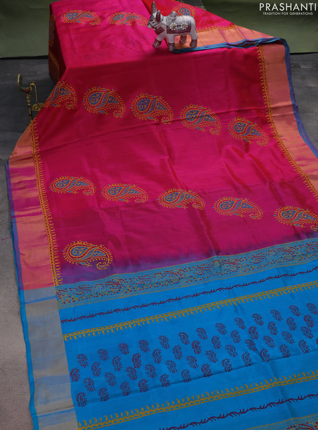 Uppada block printed silk saree dual shade of pink and teal blue with paisley butta prints and zari woven border