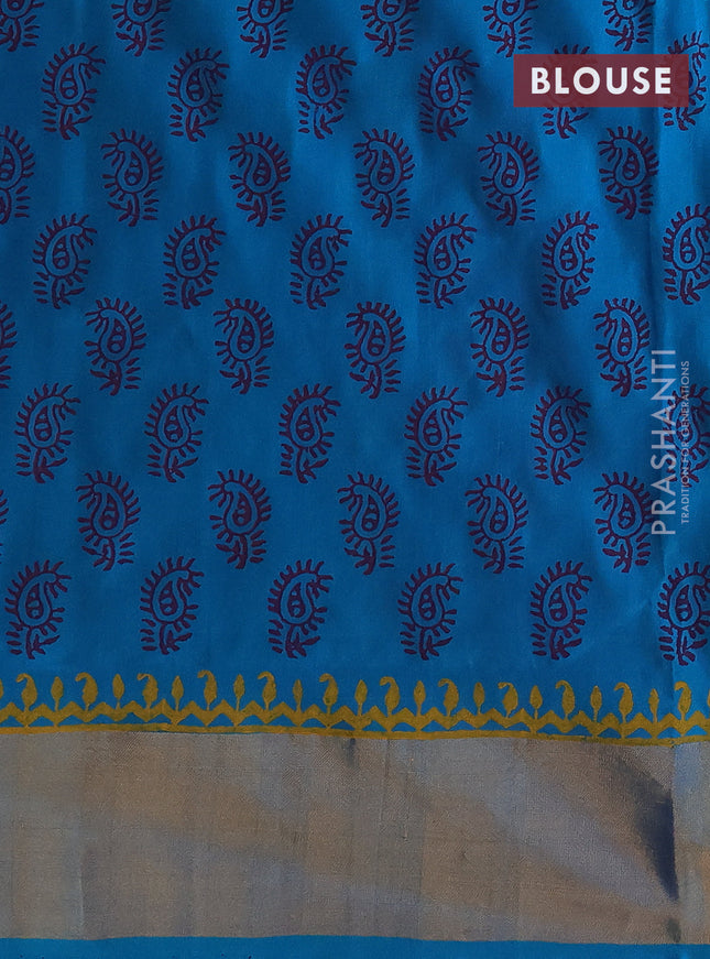 Uppada block printed silk saree dual shade of pink and teal blue with paisley butta prints and zari woven border