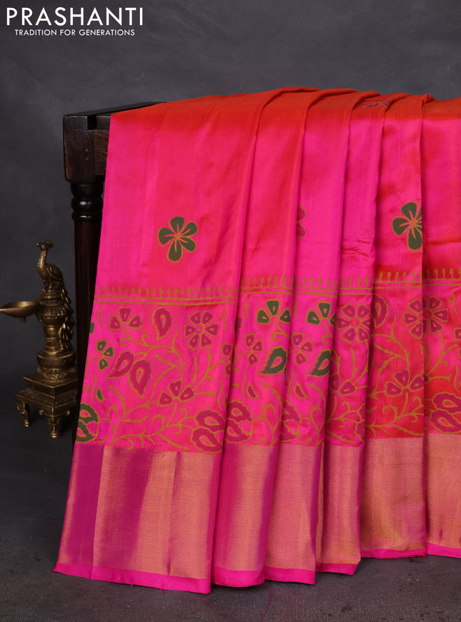Uppada block printed silk saree dual shade pinkish orange and pink with floral butta prints and zari woven border