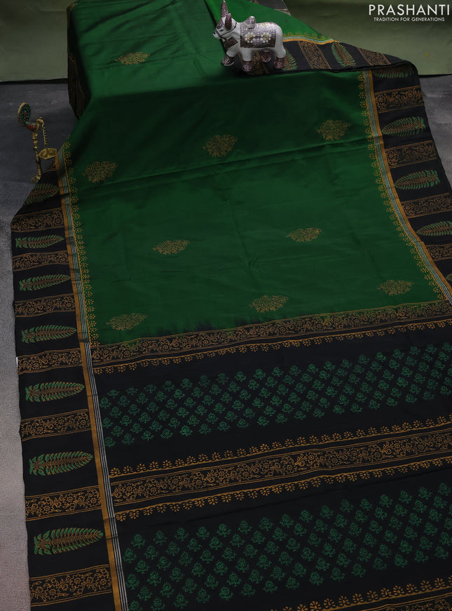 Uppada block printed silk saree green and black with butta prints and zari woven printed border
