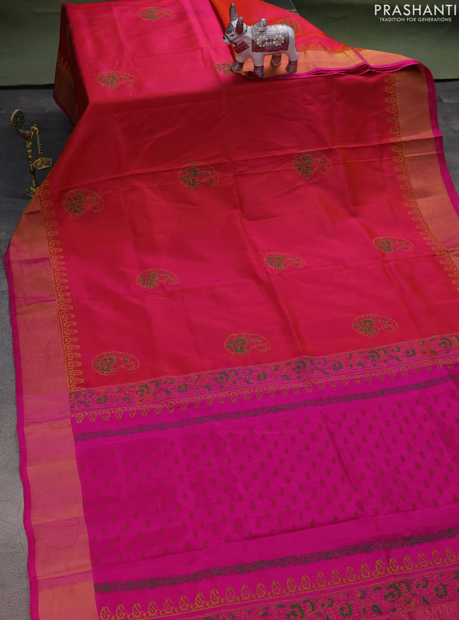 Uppada block printed silk saree dual shade of pinkish orange and pink with butta prints and zari woven border