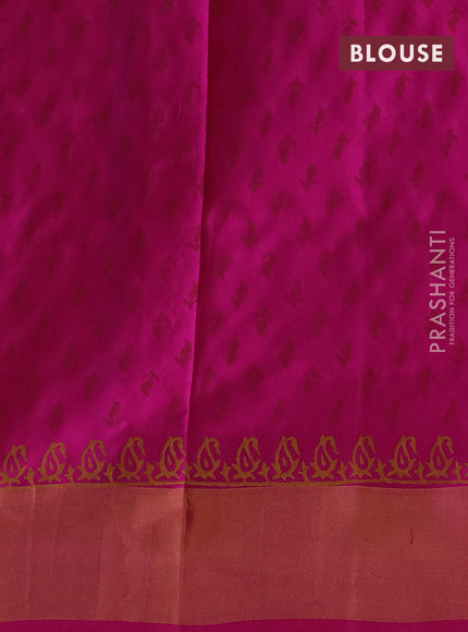 Uppada block printed silk saree dual shade of pinkish orange and pink with butta prints and zari woven border
