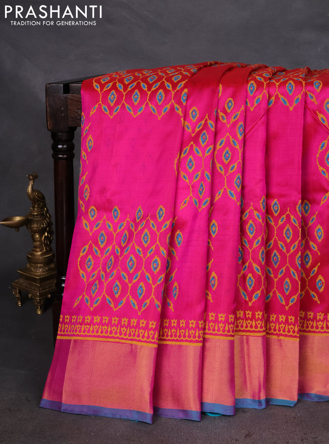 Uppada block printed silk saree pink and teal blue with prints and zari woven border