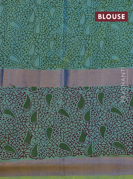 Uppada block printed silk saree cs blue and dual shade of light green with paisley butta prints and long zari woven printed border