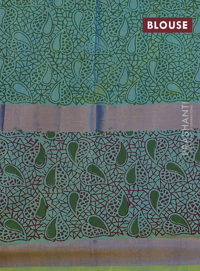 Uppada block printed silk saree cs blue and dual shade of light green with paisley butta prints and long zari woven printed border