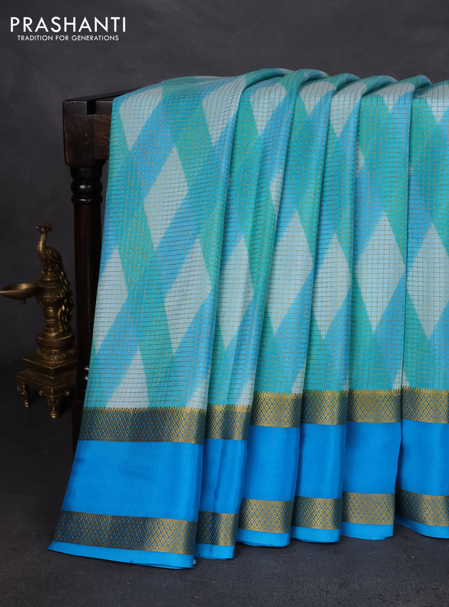 Pure mysore silk saree teal and cs blue shade with allover checks & geometric prints and rettapet zari woven border