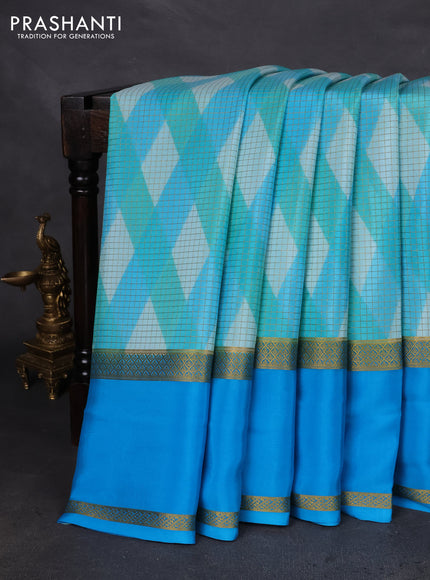 Pure mysore silk saree multi colour and teal blue with allover checks & geometric prints and rettapet zari woven border