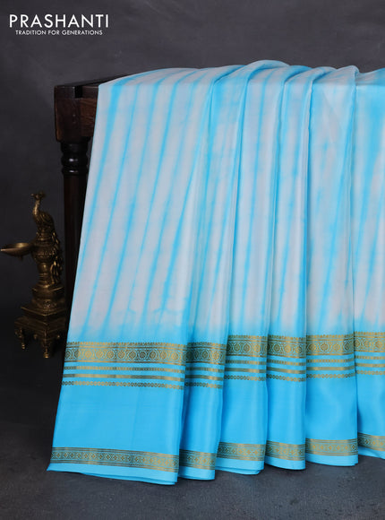 Pure mysore silk saree off white and light blue with allover shibori prints and rettapet zari woven border