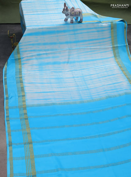 Pure mysore silk saree off white and light blue with allover shibori prints and rettapet zari woven border