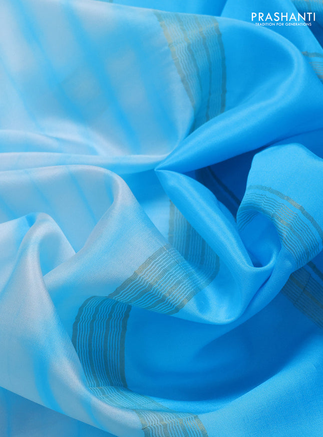 Pure mysore silk saree off white and light blue with allover shibori prints and rettapet zari woven border