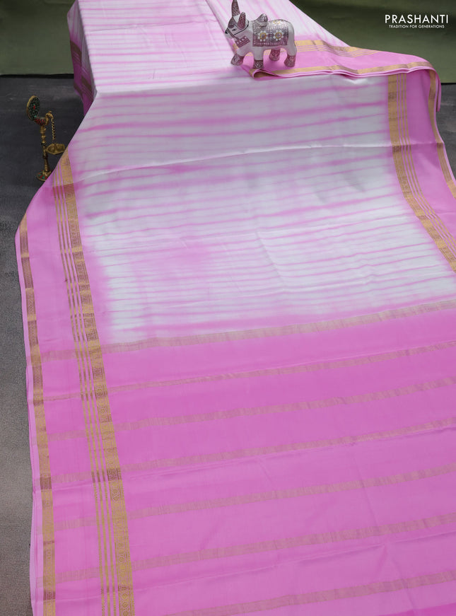 Pure mysore silk saree off white and baby pink with allover shibori prints and rettapet zari woven border