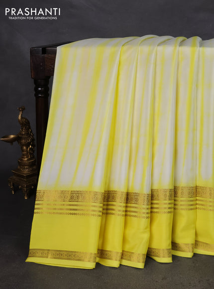Pure mysore silk saree off white and yellow with allover shibori prints and rettapet zari woven border