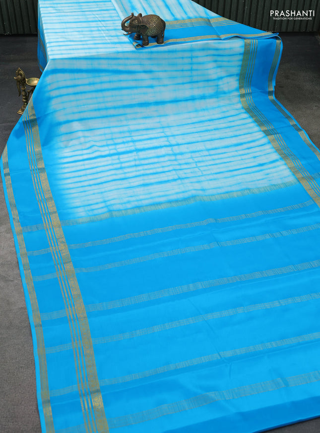Pure mysore silk saree teal blue with allover shibori prints and rettapet zari woven border