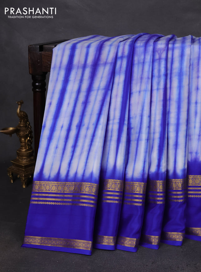 Pure mysore silk saree off white and blue with allover shibori prints and rettapet zari woven border