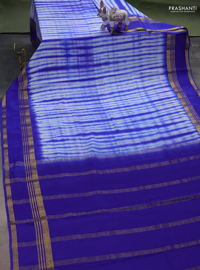 Pure mysore silk saree off white and blue with allover shibori prints and rettapet zari woven border