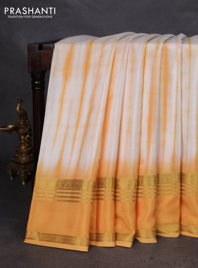 Pure mysore silk saree off white and mustard yellow with allover shibori prints and rettapet zari woven border