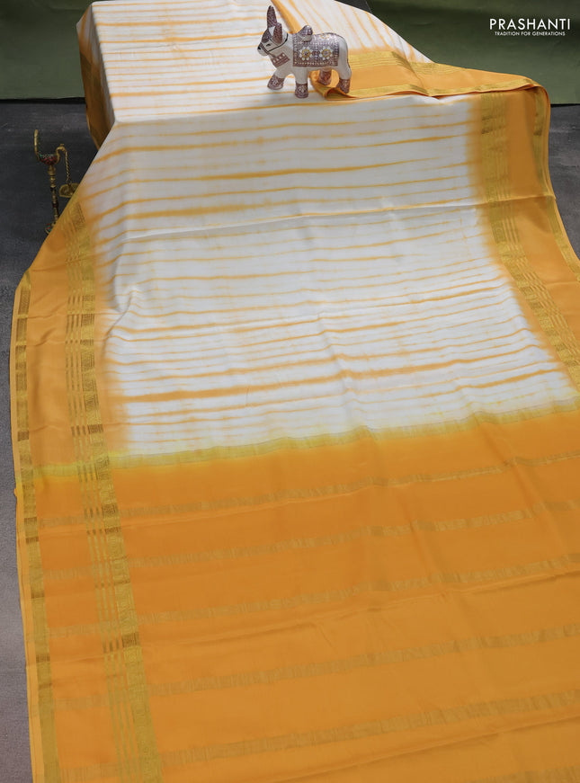 Pure mysore silk saree off white and mustard yellow with allover shibori prints and rettapet zari woven border