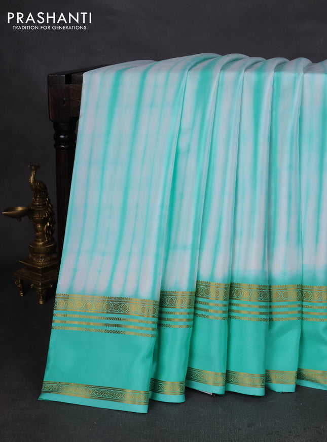 Pure mysore silk saree off white and teal green with allover shibori prints and rettapet zari woven border