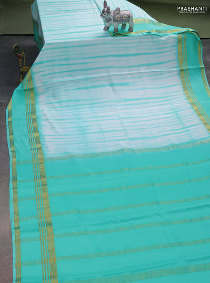 Pure mysore silk saree off white and teal green with allover shibori prints and rettapet zari woven border