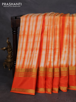 Pure mysore silk saree pale orange and orange with allover shibori prints and rettapet zari woven border