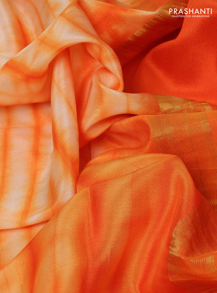 Pure mysore silk saree pale orange and orange with allover shibori prints and rettapet zari woven border