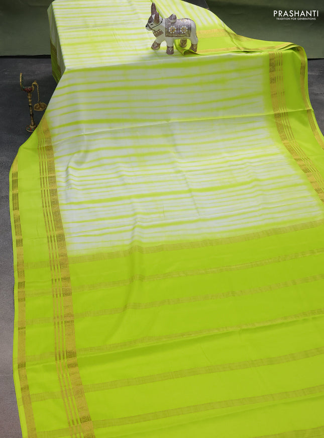 Pure mysore silk saree off white and fluorescent green with allover shibori prints and rettapet zari woven border