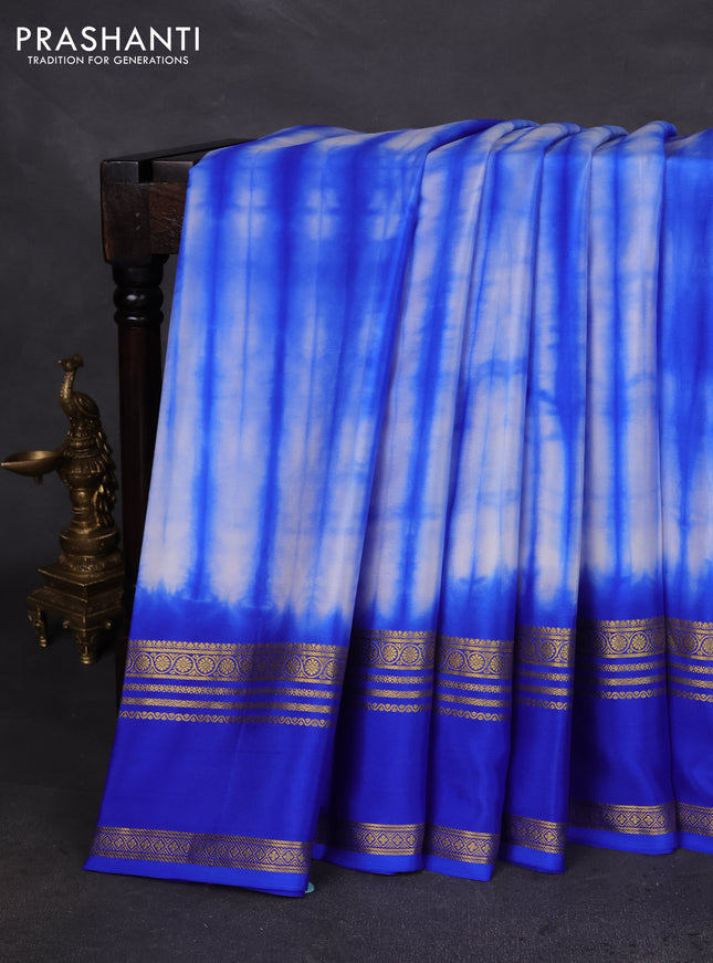 Pure mysore silk saree off white and blue with allover shibori prints and rettapet zari woven border