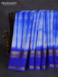 Pure mysore silk saree off white and blue with allover shibori prints and rettapet zari woven border