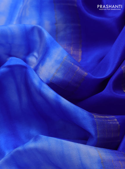 Pure mysore silk saree off white and blue with allover shibori prints and rettapet zari woven border