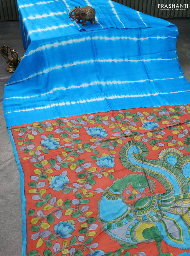 Printed silk saree cs blue and orange with shibori prints and kalamkari hand painted pallu & blouse