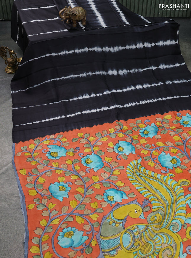 Printed silk saree black and rustic orange with shibori prints and kalamkari hand painted pallu & blouse