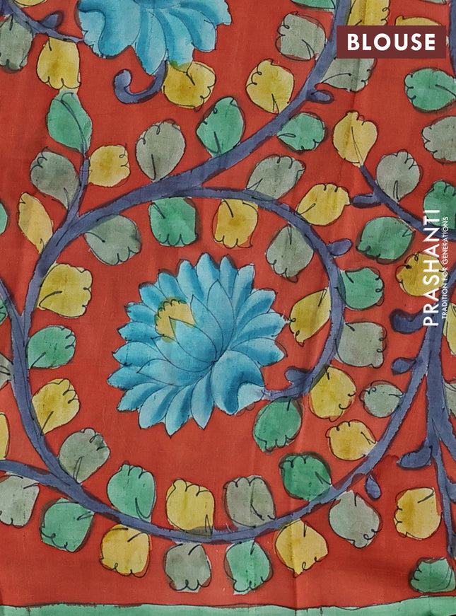 Printed silk saree green and rustic orange with shibori prints and kalamkari hand painted pallu & blouse