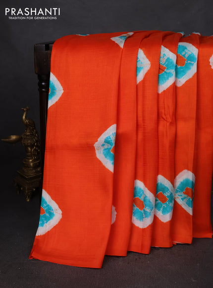 Printed silk saree orange and teal blue with shibori butta prints and kalamkari hand painted pallu & blouse