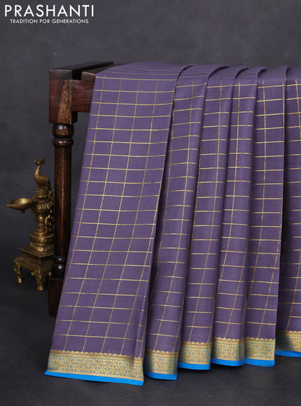 Pure mysore silk saree grey and cs blue with allover zari checks and zari woven border