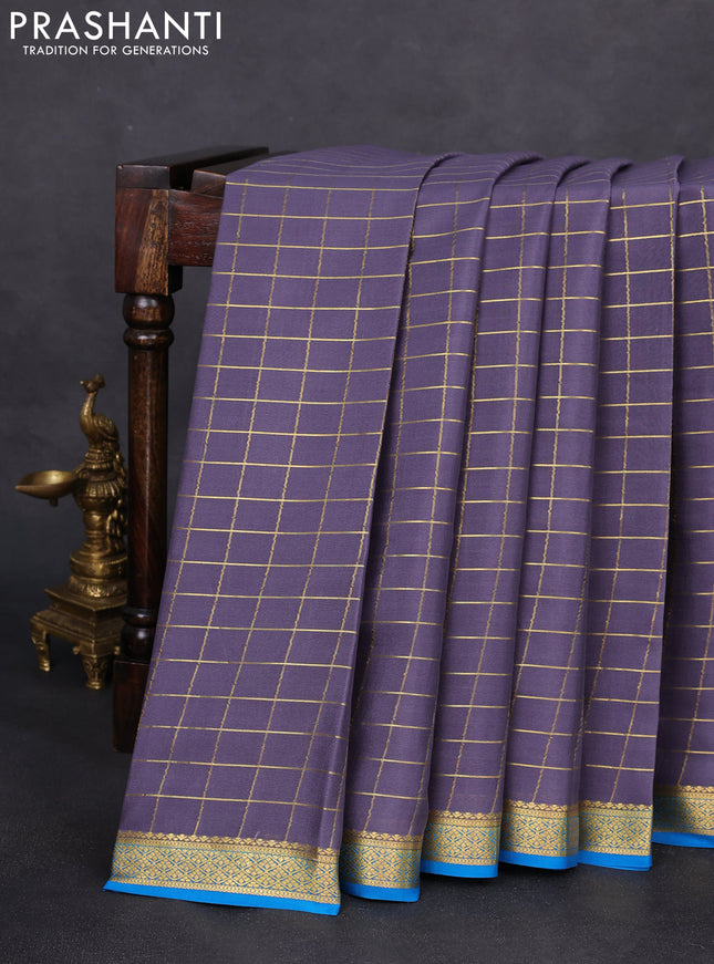 Pure mysore silk saree grey and cs blue with allover zari checks and zari woven border