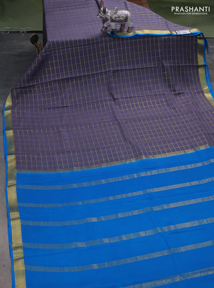 Pure mysore silk saree grey and cs blue with allover zari checks and zari woven border