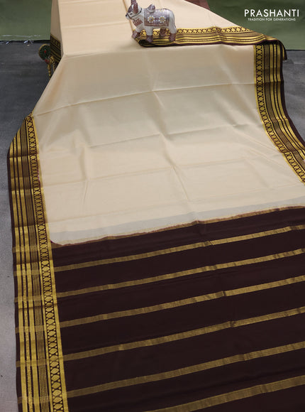 Pure mysore silk saree cream and deep coffee brown with plain body and zari woven border