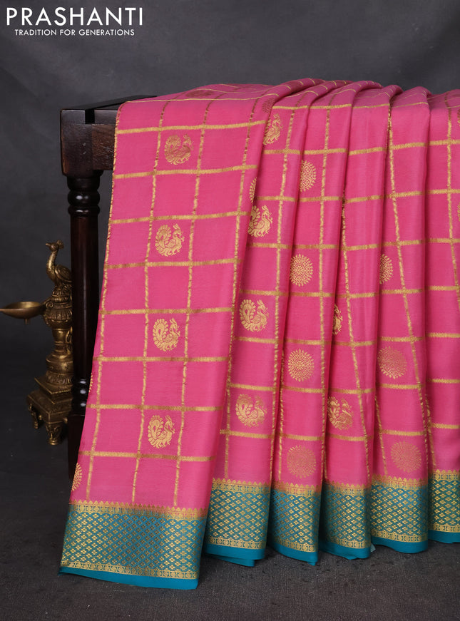 Pure mysore silk saree peach pink and cs blue with allover zari checked pattern and zari woven border