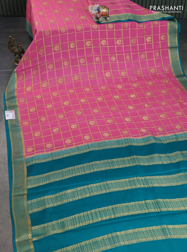 Pure mysore silk saree peach pink and cs blue with allover zari checked pattern and zari woven border