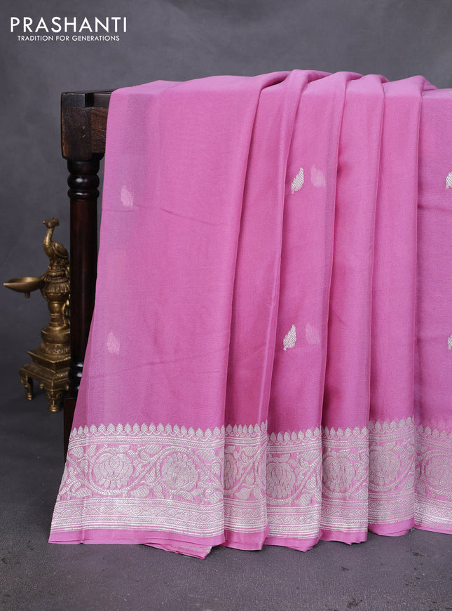 Banarasi chiffon silk saree pastel pink with silver zari woven buttas and silver zari woven floral border