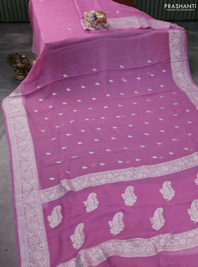 Banarasi chiffon silk saree pastel pink with silver zari woven buttas and silver zari woven floral border