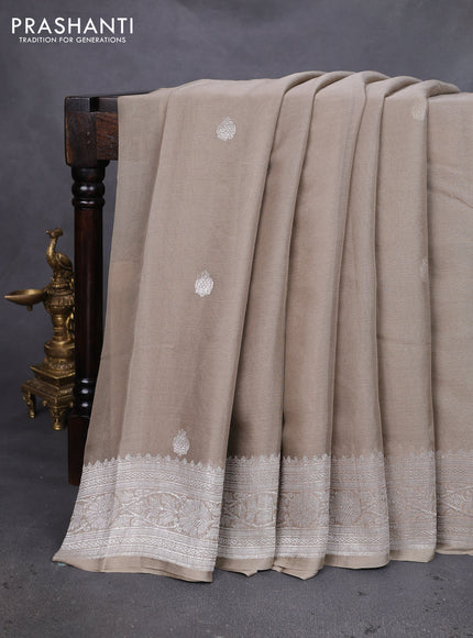 Banarasi chiffon silk saree beige with silver zari woven buttas and silver zari woven floral border