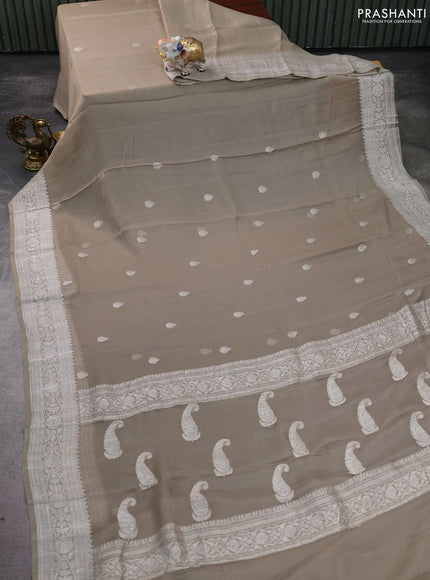 Banarasi chiffon silk saree beige with silver zari woven buttas and silver zari woven floral border