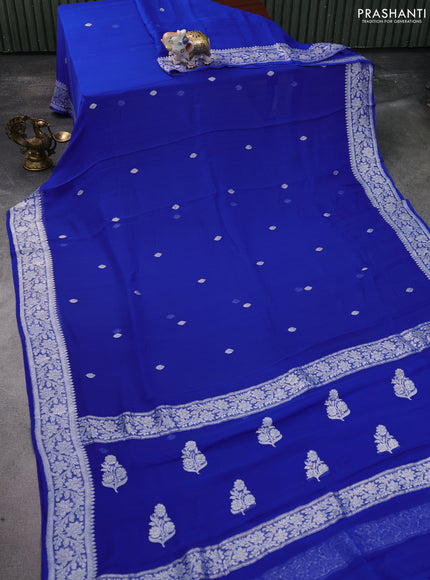 Banarasi chiffon silk saree blue with silver zari woven buttas and silver zari woven floral border