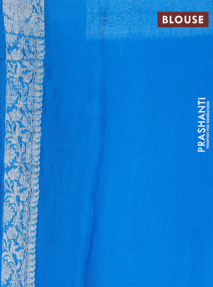 Banarasi chiffon silk saree cs blue with silver zari woven buttas and silver zari woven floral border