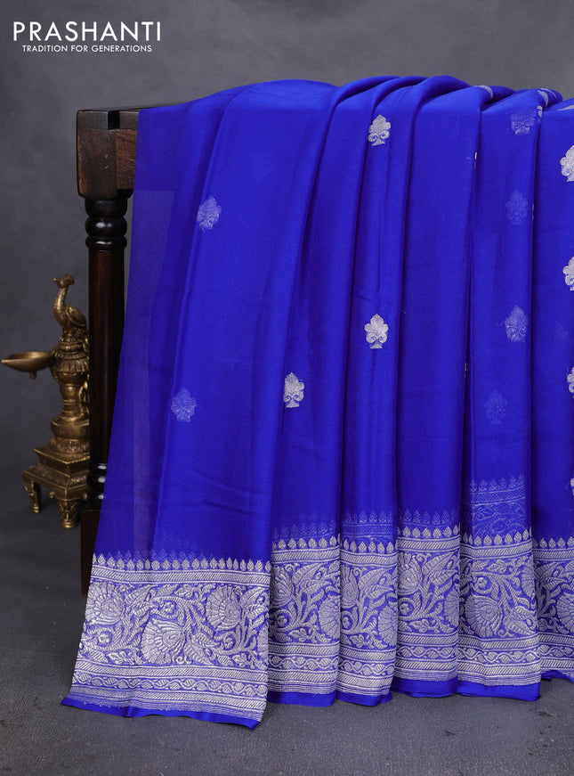 Banarasi chiffon silk saree royal blue with silver zari woven buttas and silver zari woven floral border