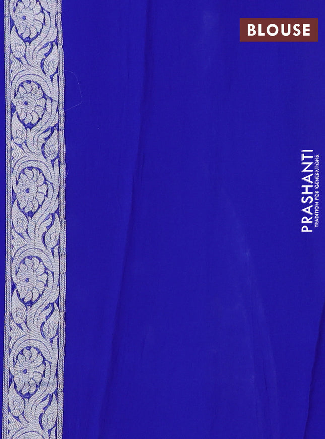 Banarasi chiffon silk saree royal blue with silver zari woven buttas and silver zari woven floral border