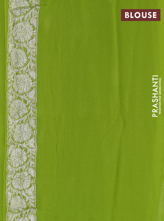 Banarasi chiffon silk saree light green with silver zari woven buttas and silver zari woven floral border