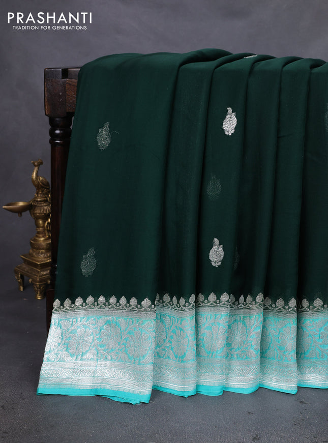 Banarasi chiffon silk saree bottle green and teal green shade with silver zari woven buttas and silver zari woven floral border