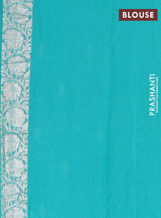 Banarasi chiffon silk saree bottle green and teal green shade with silver zari woven buttas and silver zari woven floral border